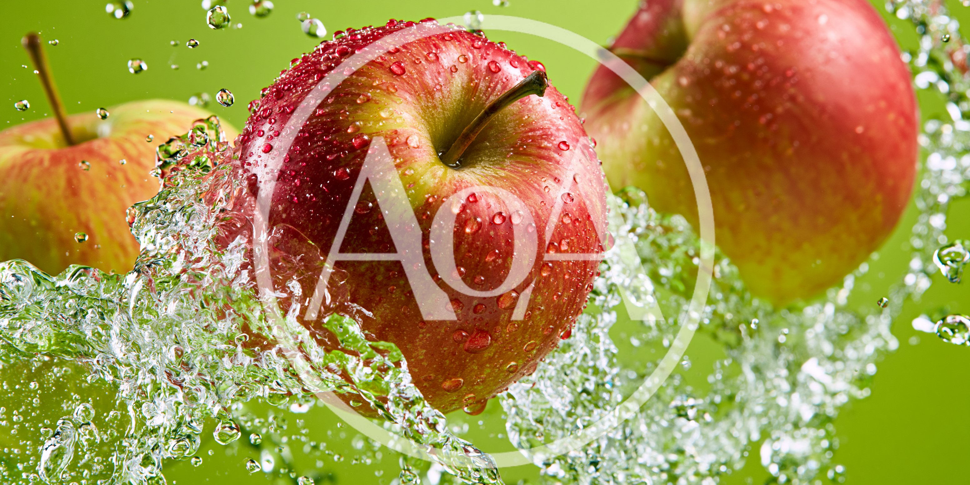 Fresh Red Apples Splashing In Clear Water