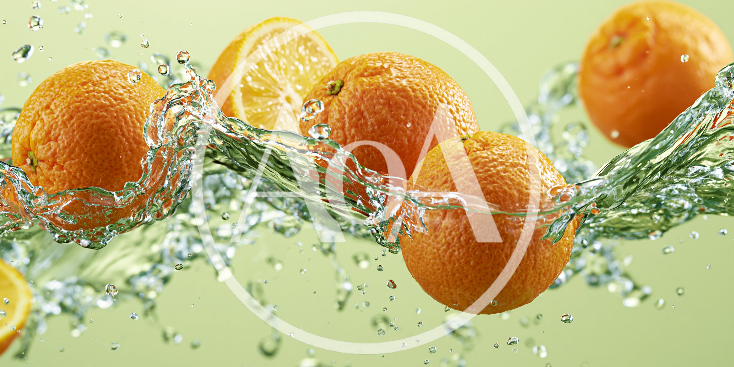 Fresh Oranges Splashing In Clear Water