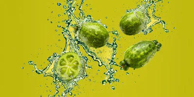 Fresh Feijoa Fruits Splashing In Water