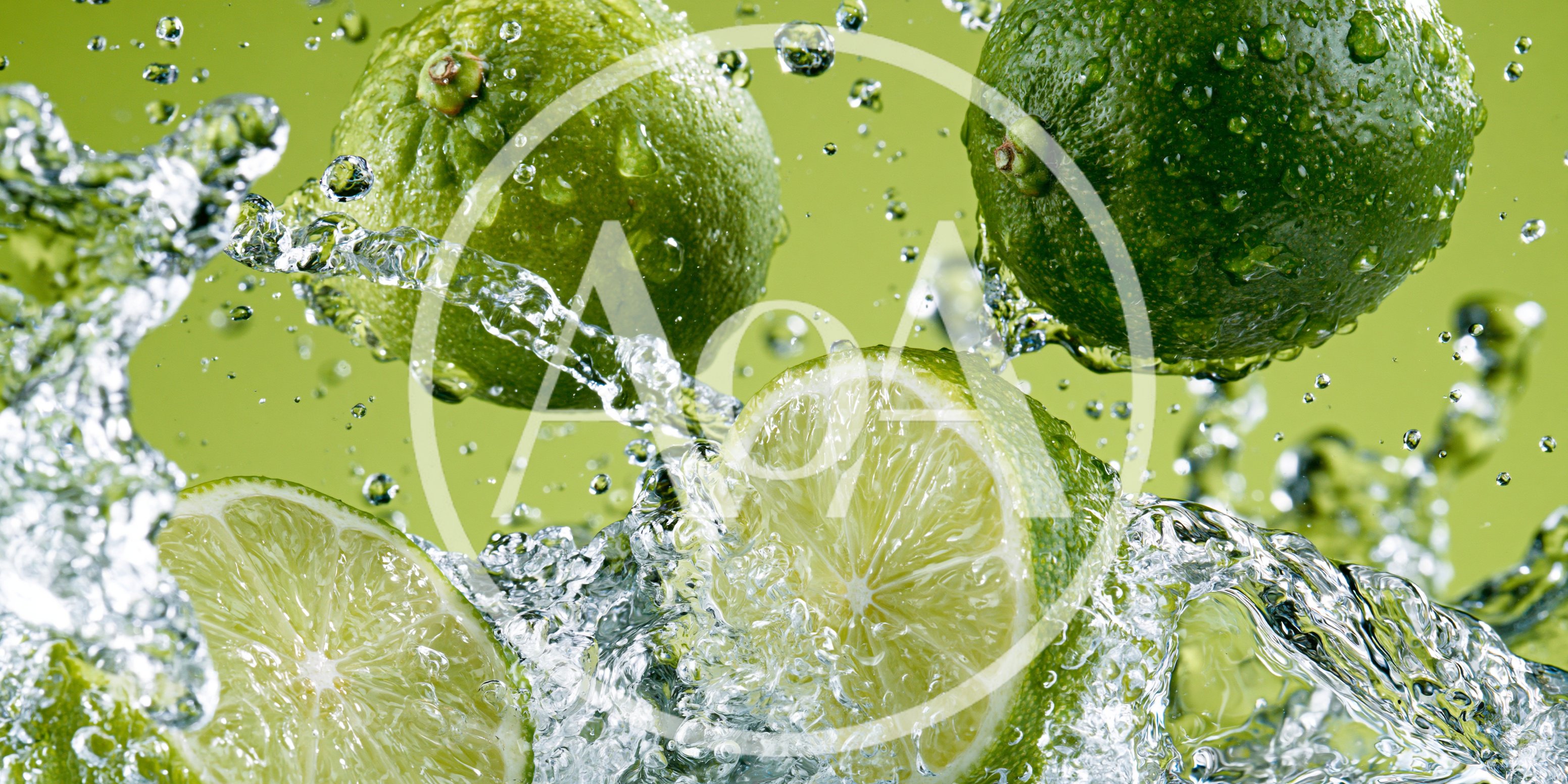 Fresh Limes Splashing In Clear Water