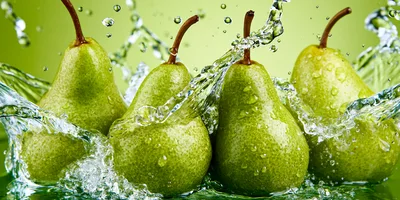 Fresh Green Pears Splashing In Clear Water