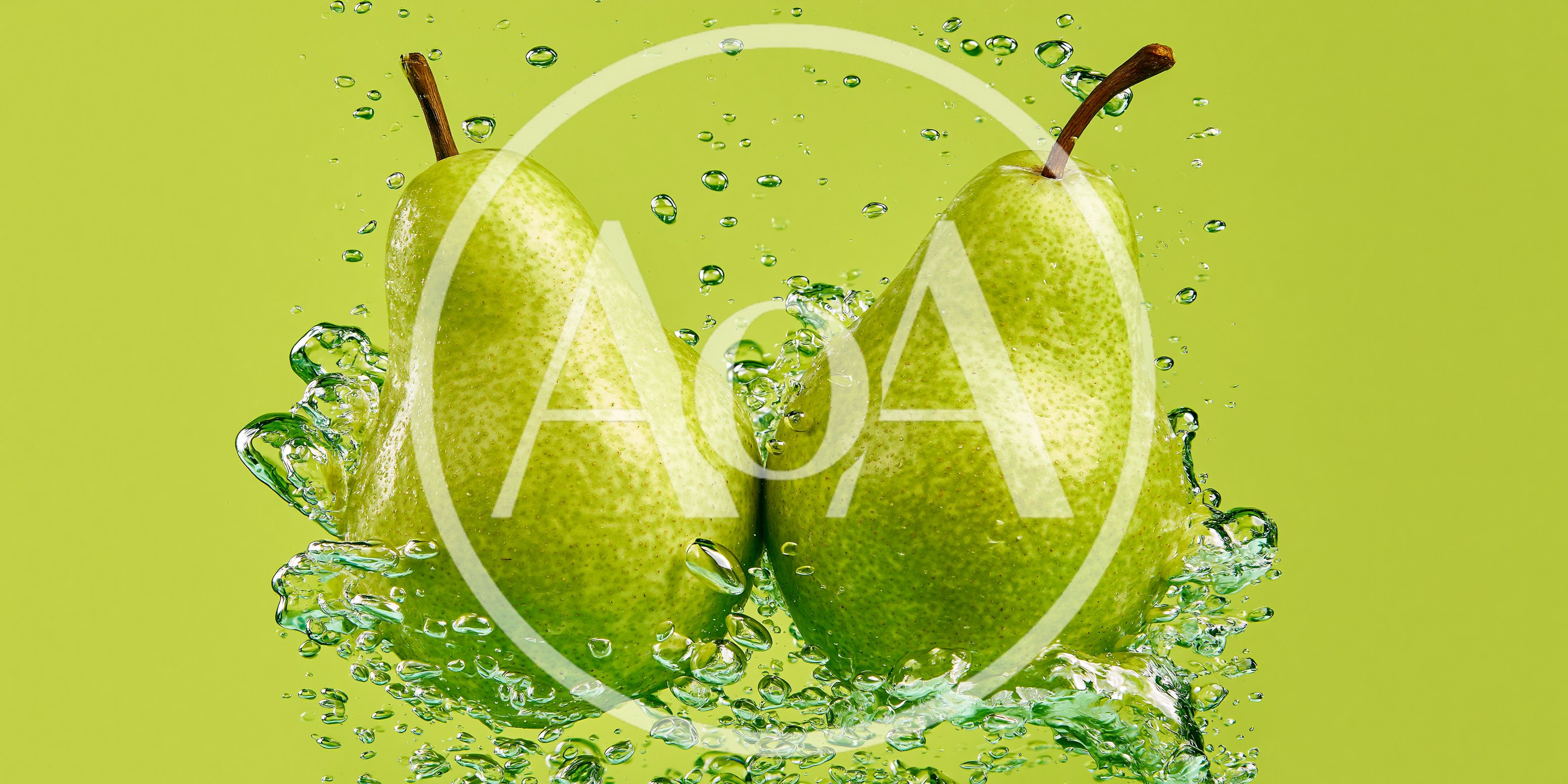 Two Fresh Green Pears Splashing In Water