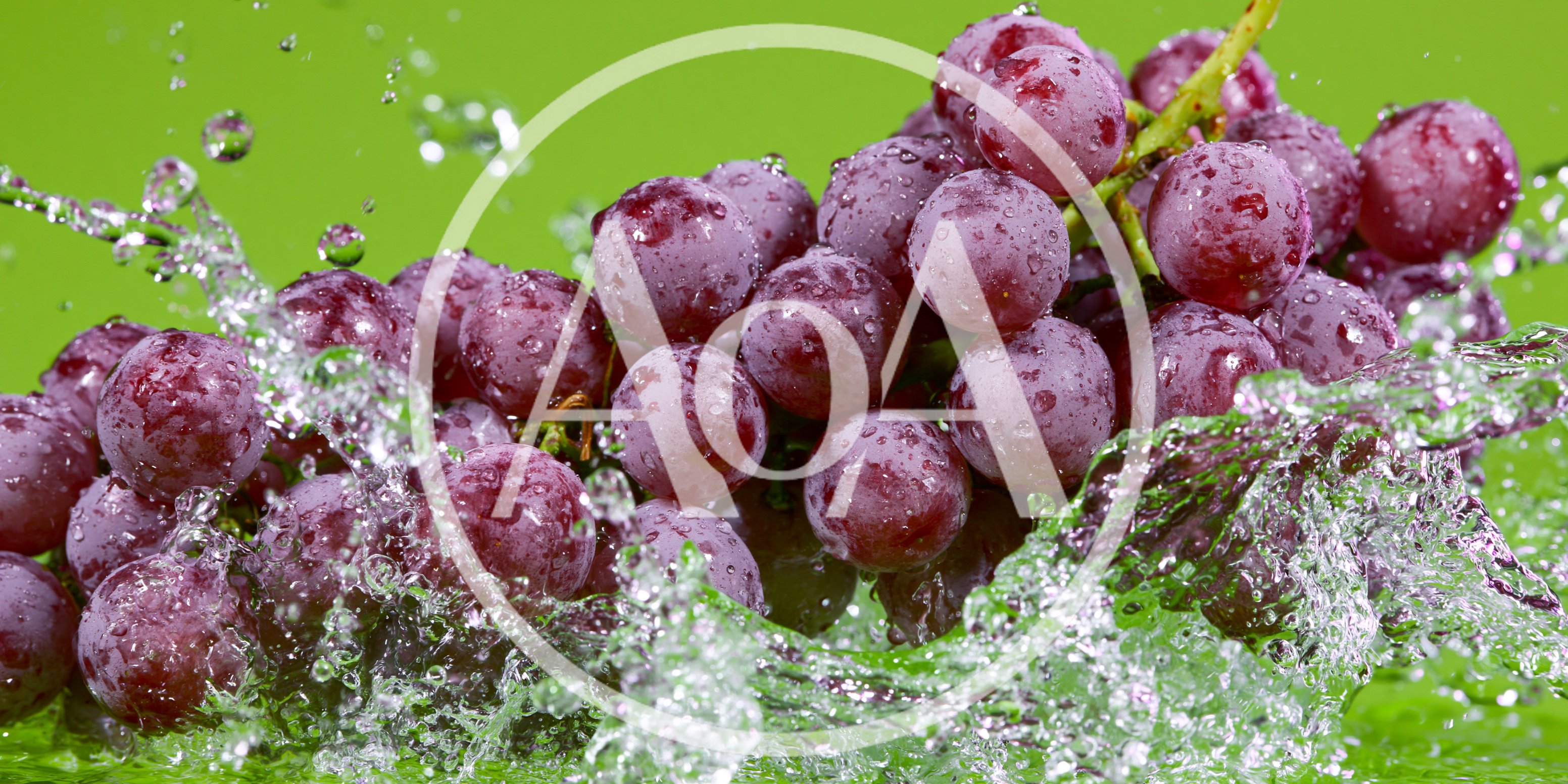 Fresh Red Grapes Splashing In Clear Water