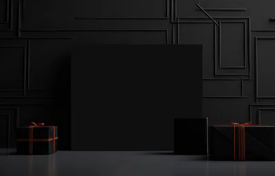 Black Gift Boxes With Orange Ribbons On Dark Background