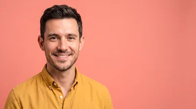 Portrait Of A Smiling Man In A Yellow Shirt