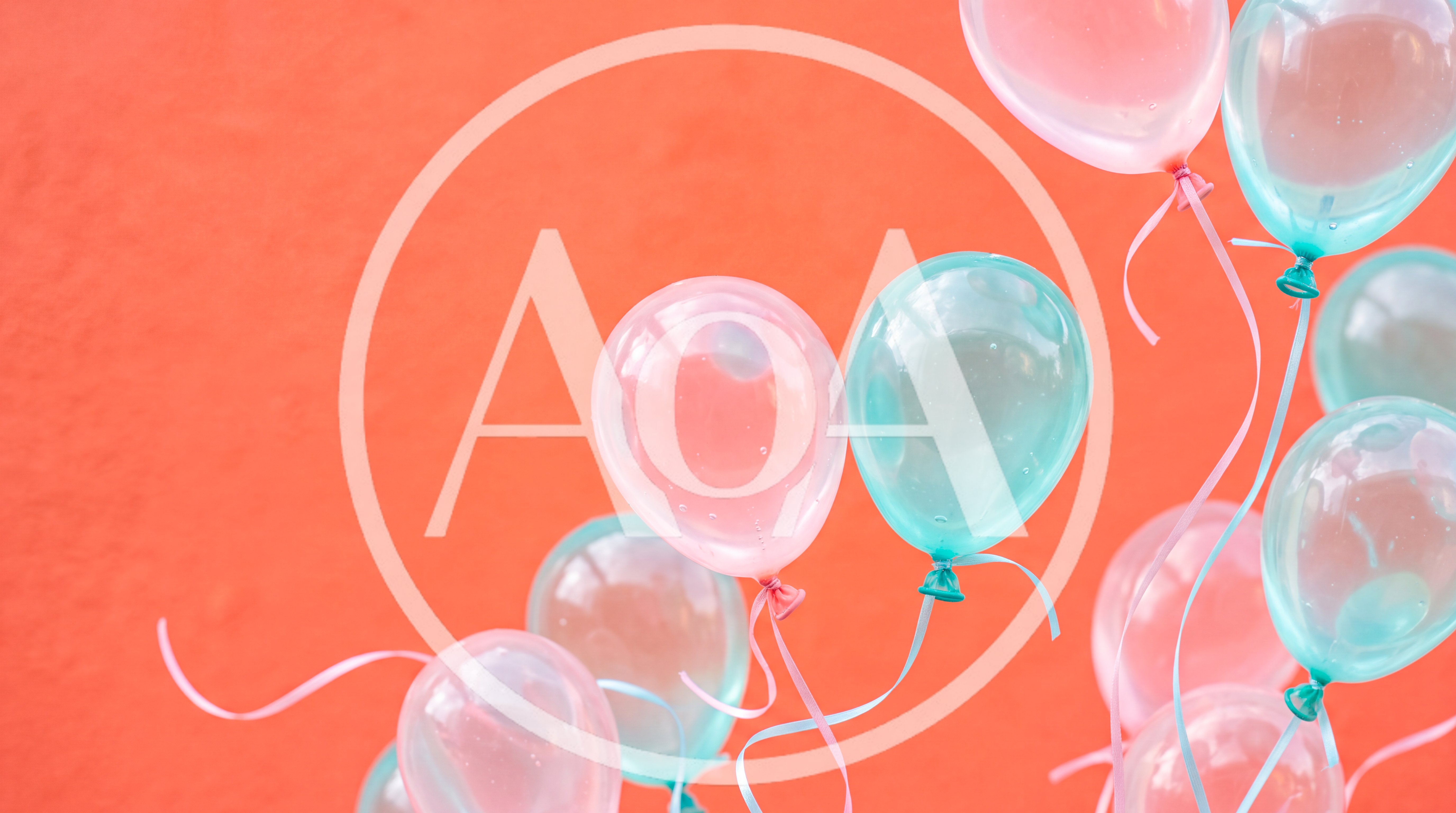 Floating Pastel Balloons Against A Vibrant Orange Background
