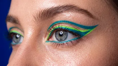 Close Up Of Woman With Artistic Graphic Eyeliner