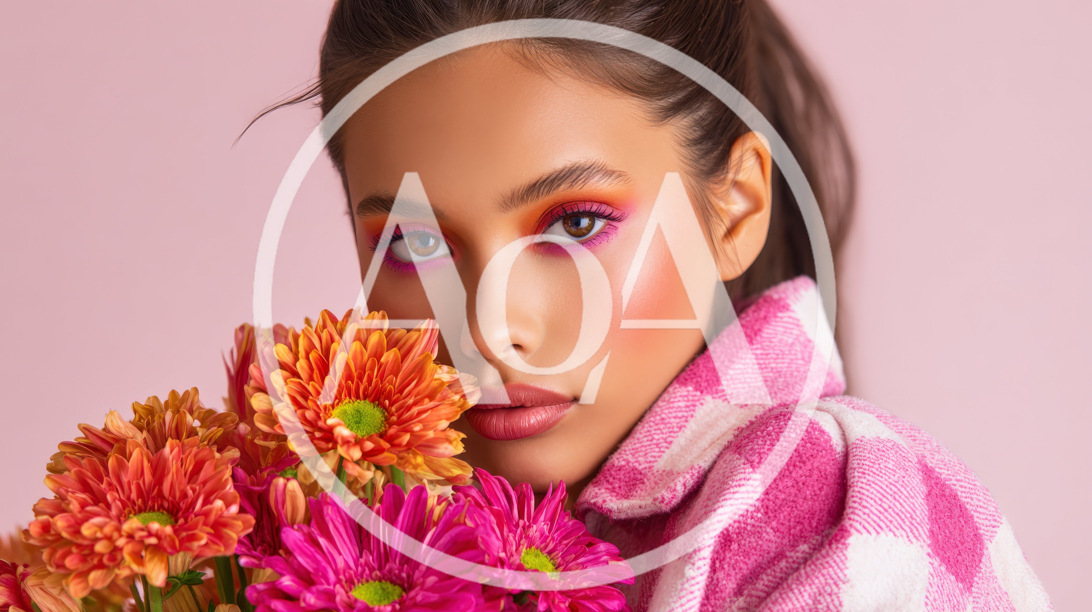 Portrait of a Young Woman Holding Vibrant Flowers