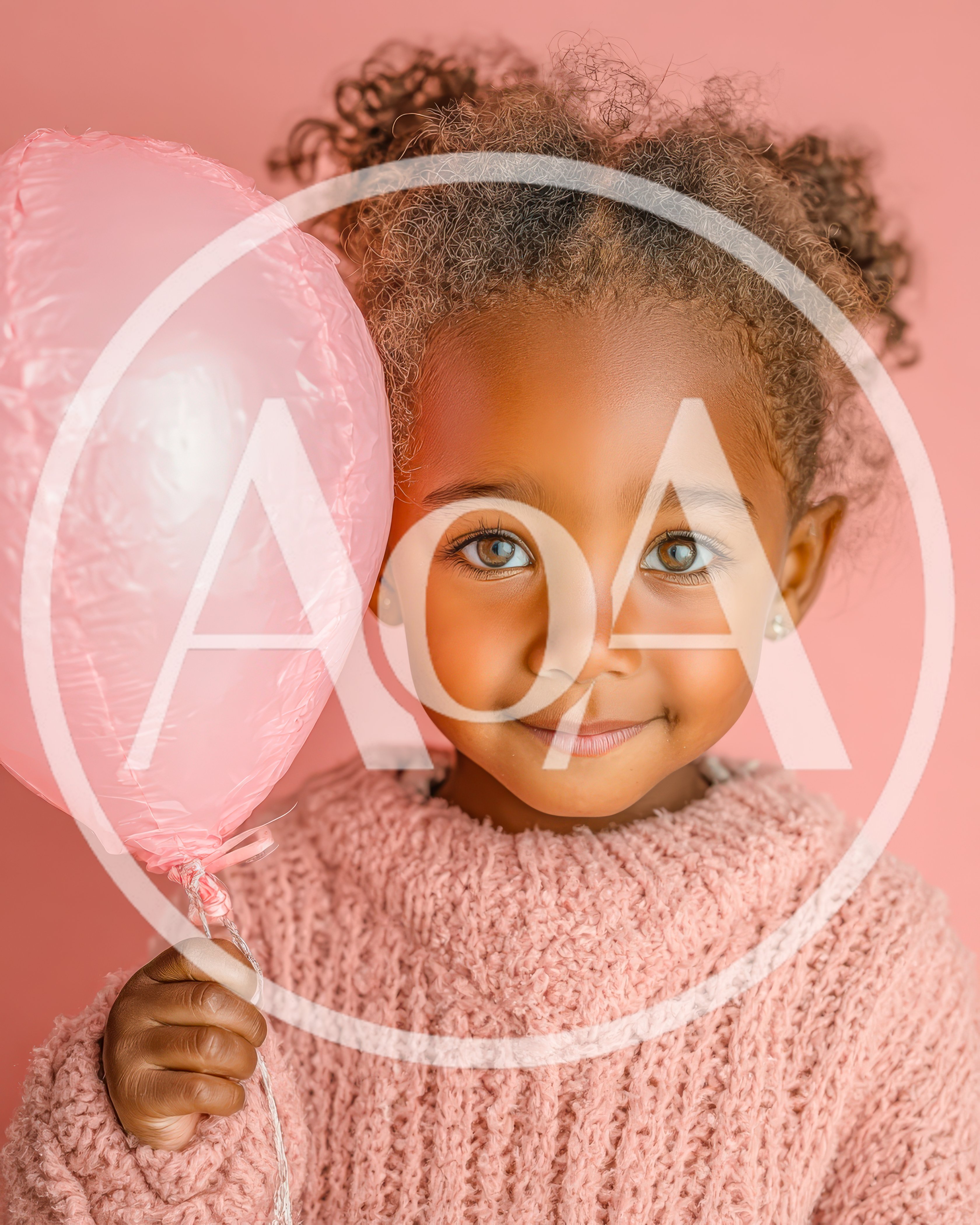 Adorable Young Girl Holding A Pink Balloon