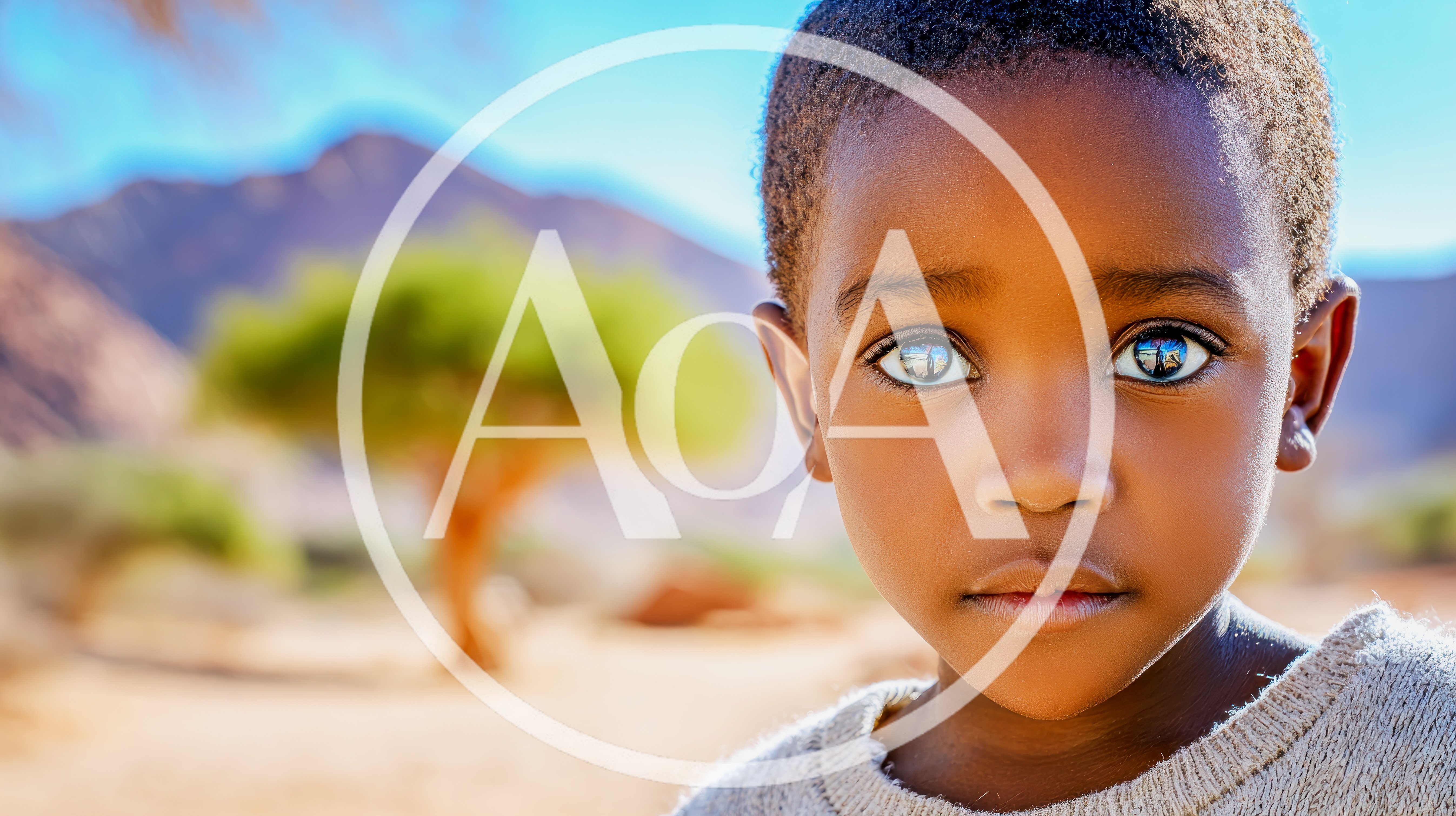 Portrait Of A Young African Boy In The Desert
