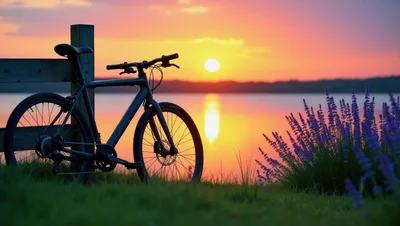Bicycle Parked By A Lake At Sunset