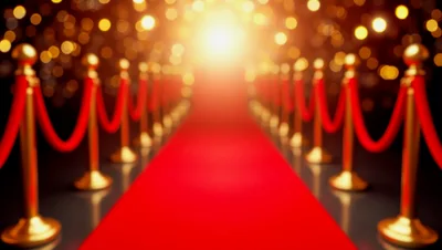 Red Carpet Entrance With Golden Stanchions And Bokeh Lights