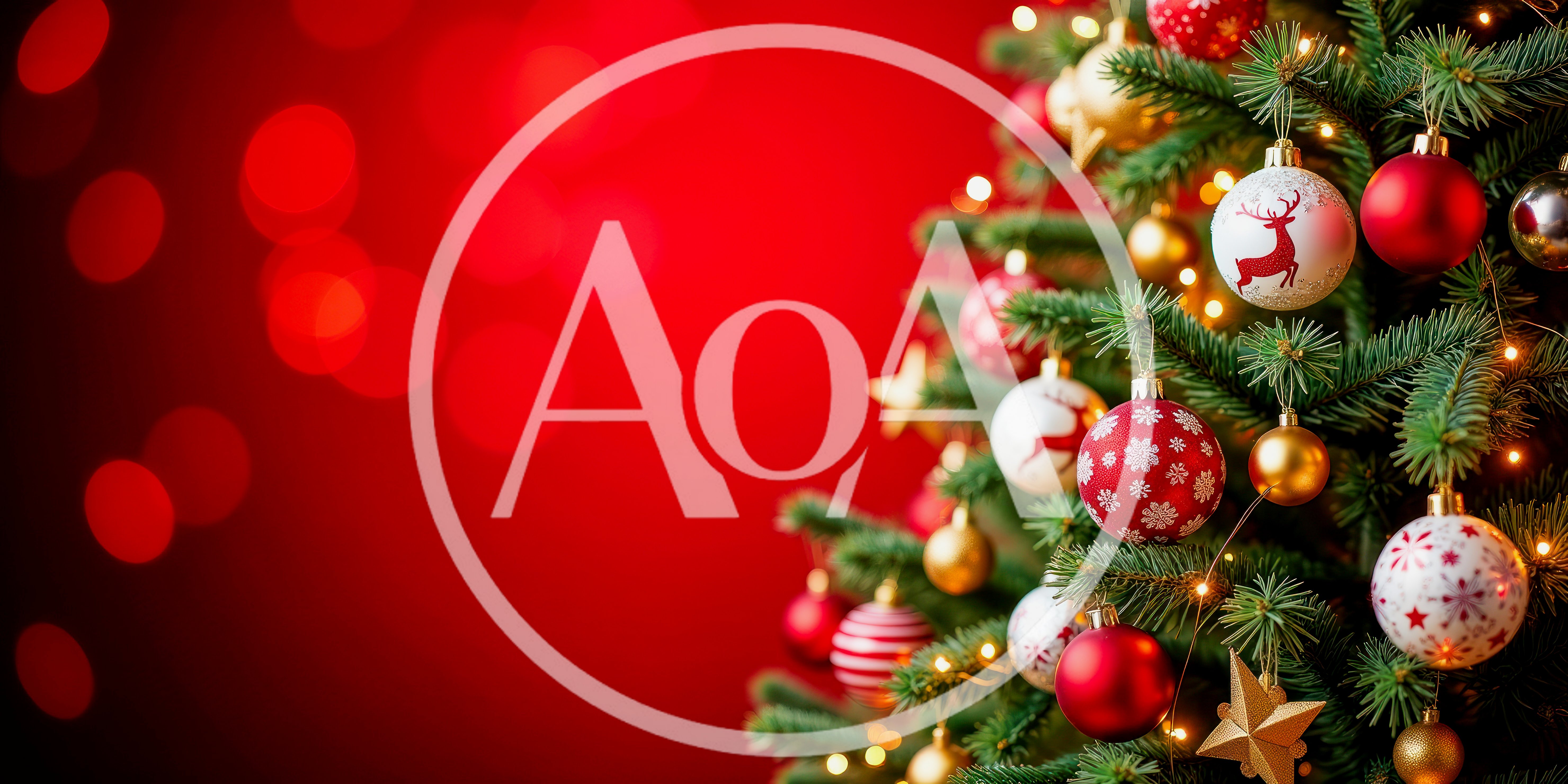 Decorated Christmas Tree Against A Blurred Red Background