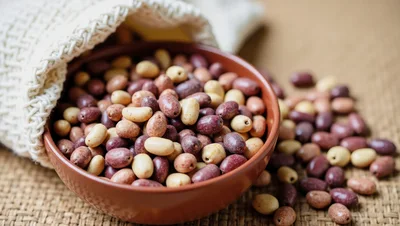 Bowl Of Mixed Colored Olives On Burlap