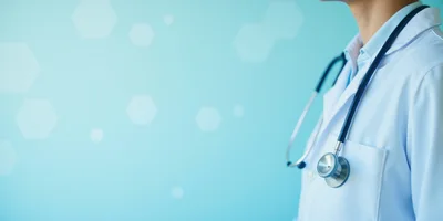 Doctor Wearing White Lab Coat With Stethoscope