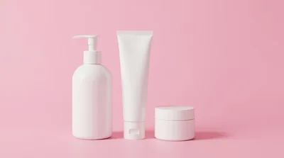 White Cosmetic Bottles On Pink Background