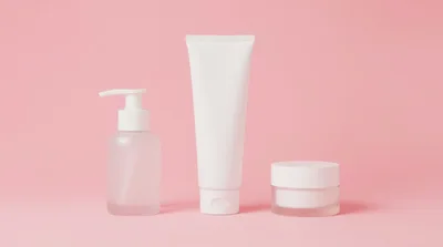 Cosmetic Skincare Product Containers on Pink Background