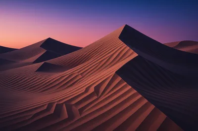 Sand Dunes Under A Vibrant Sunset Sky