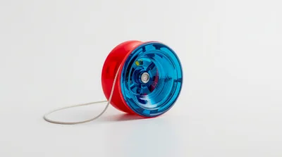 Red and Blue Plastic Yo-Yo on White Background