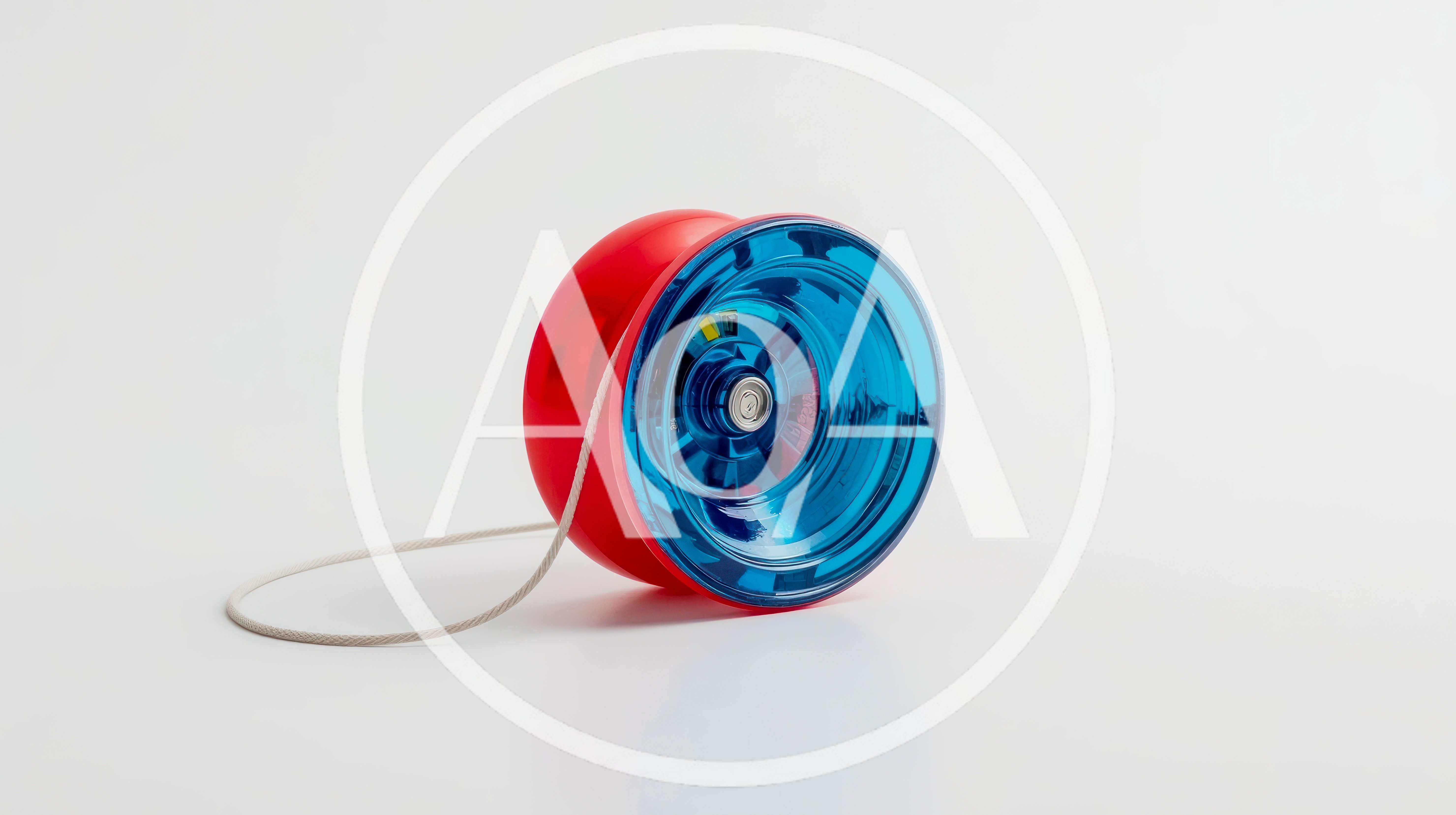 Red and Blue Plastic Yo-Yo on White Background