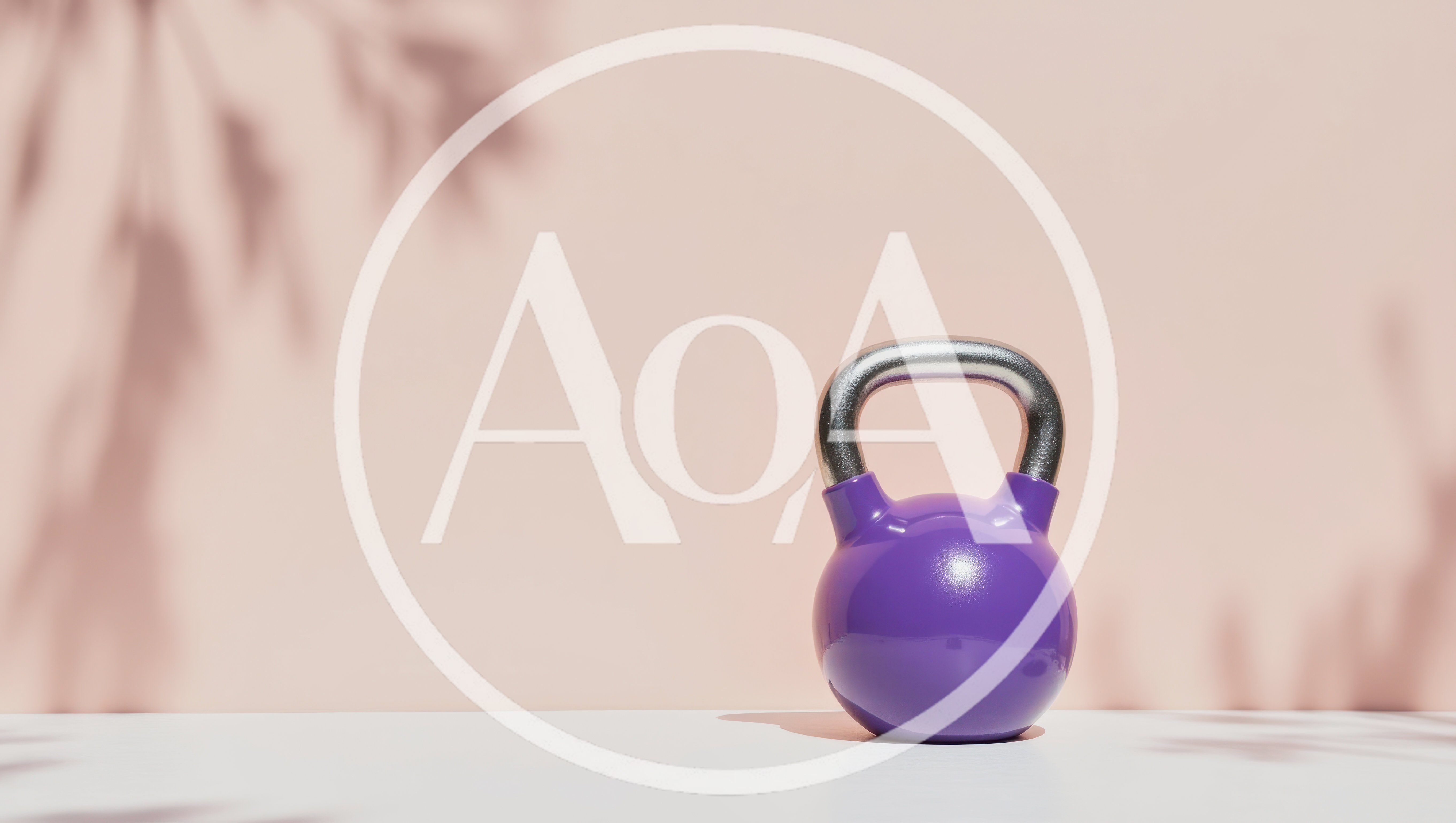 Purple Kettlebell on White Surface with Soft Shadows
