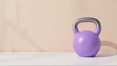 Purple Kettlebell on a White Surface