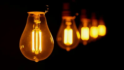 Row Of Glowing Vintage Edison Light Bulbs