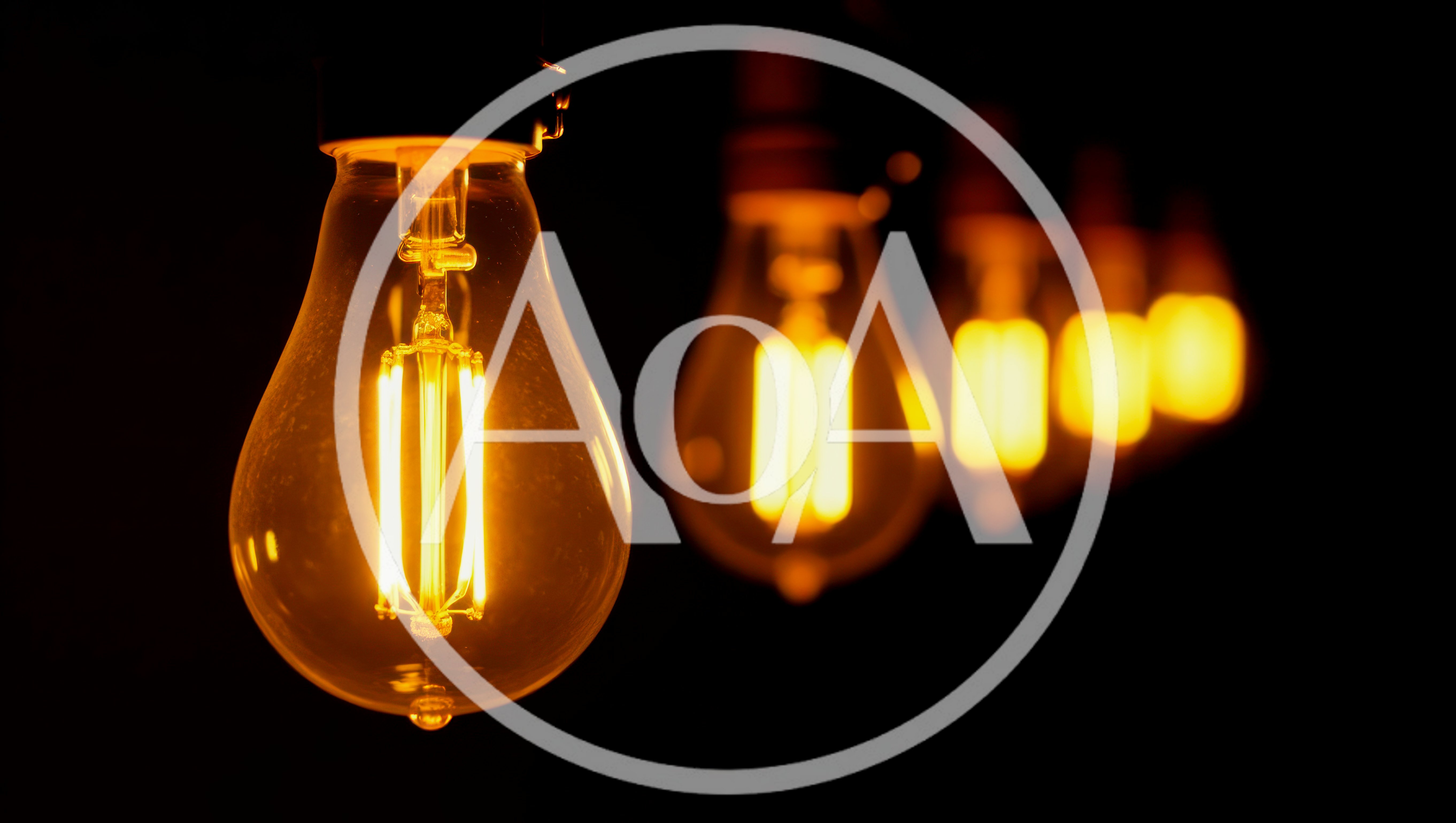 Row Of Glowing Vintage Edison Light Bulbs