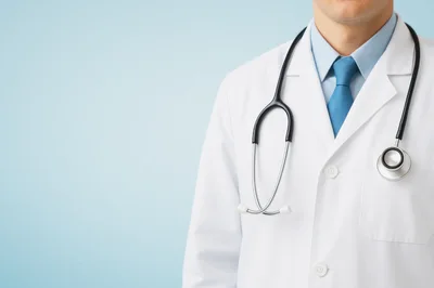 Doctor Wearing White Lab Coat With Stethoscope