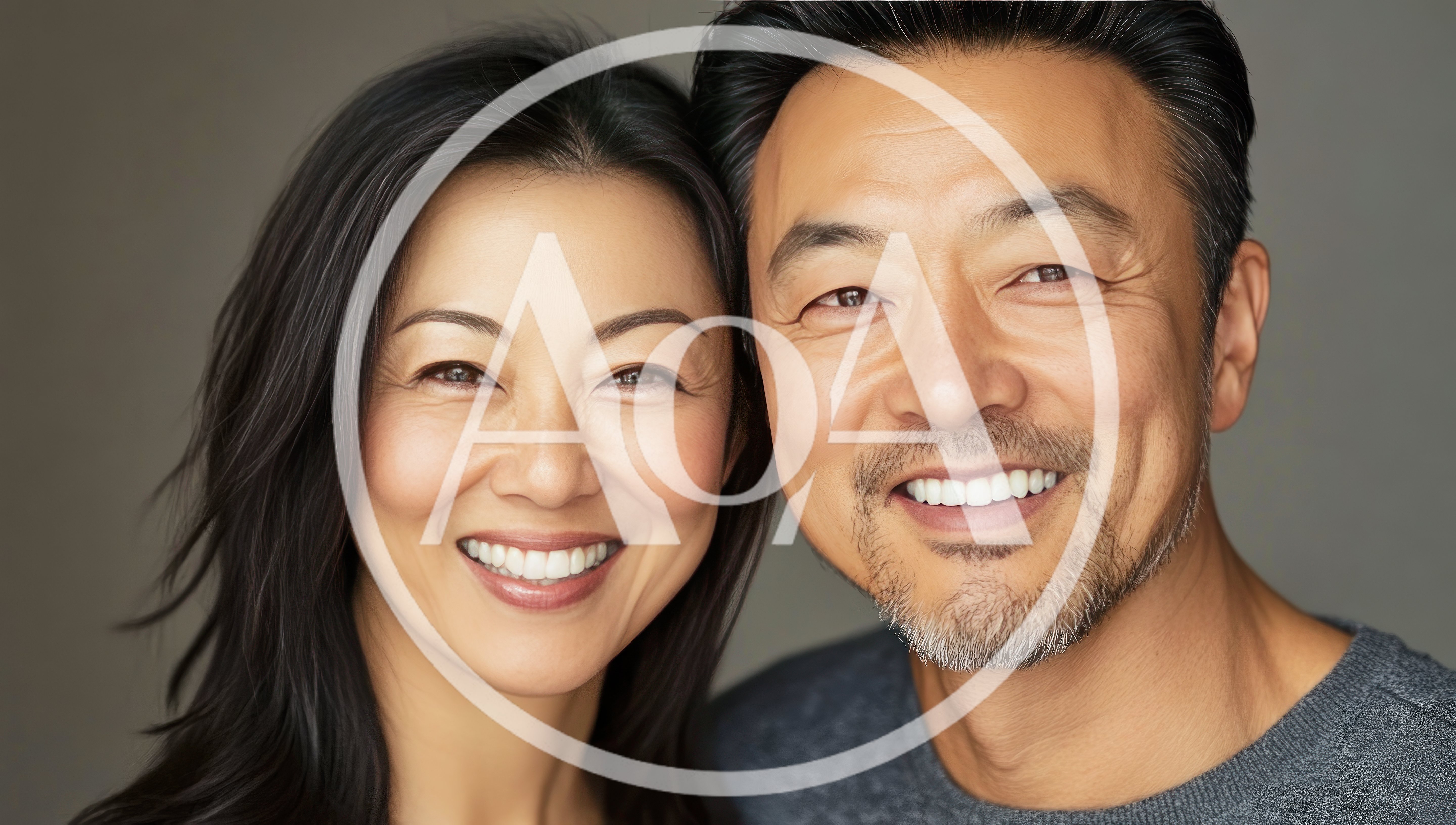 Portrait Of A Smiling Middle Aged Asian Couple