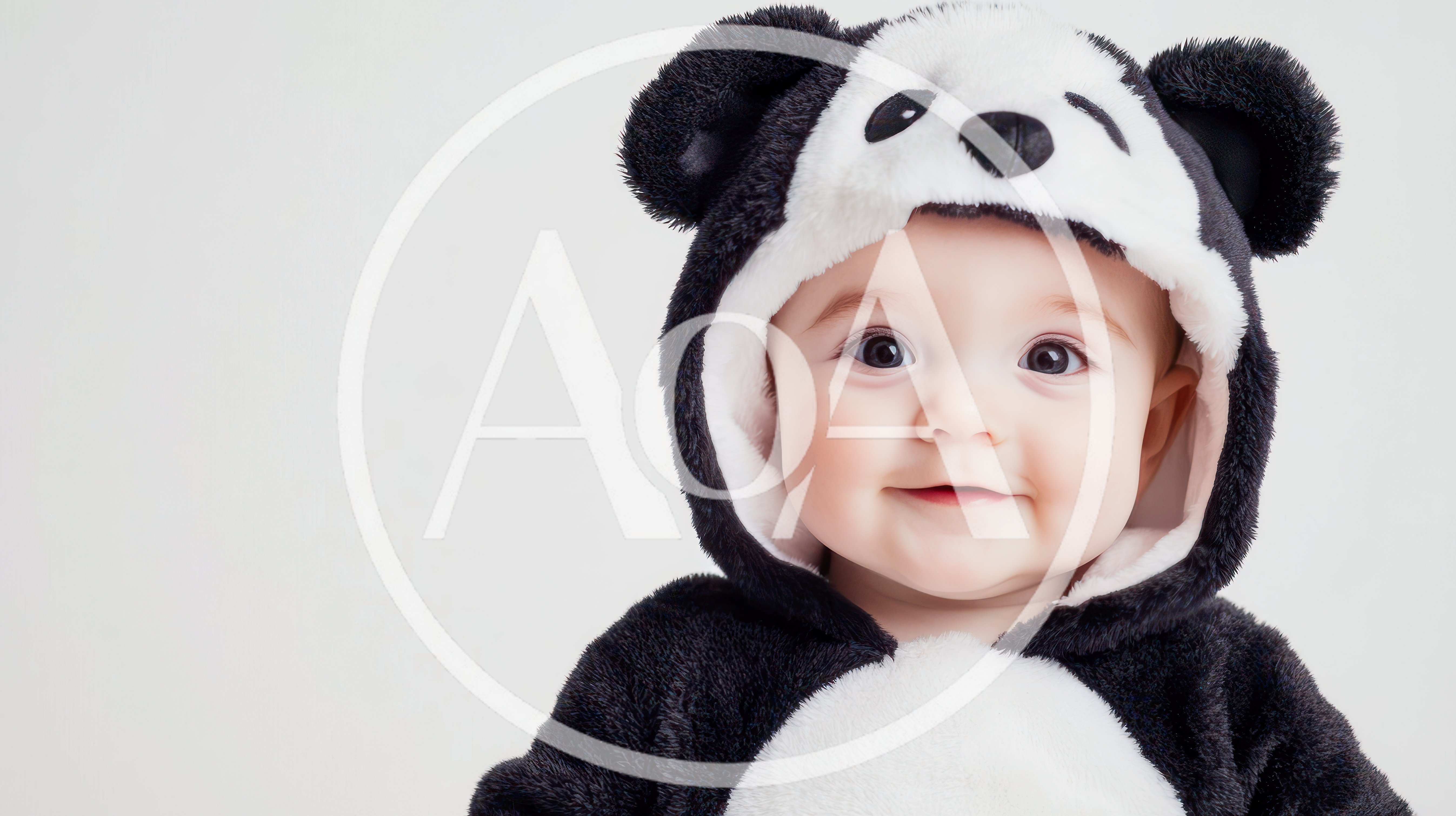 Adorable Baby Wearing A Soft Panda Costume