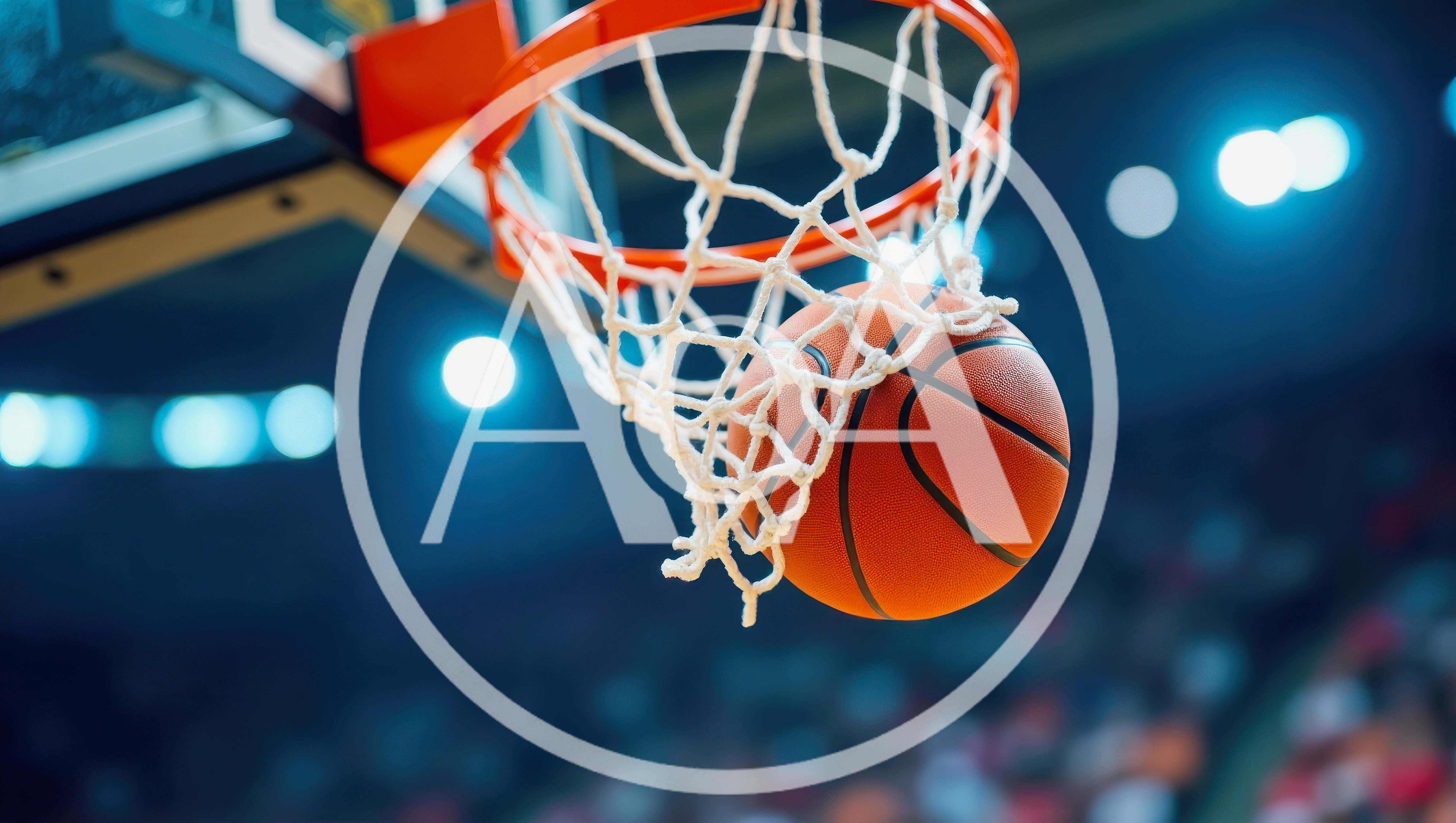 Basketball Passing Through The Hoop Net
