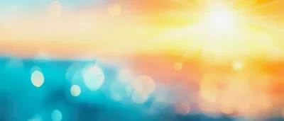 Abstract Blurred Ocean Sunset Background With Bokeh