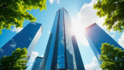 Modern Glass Skyscrapers Under Bright Blue Sky