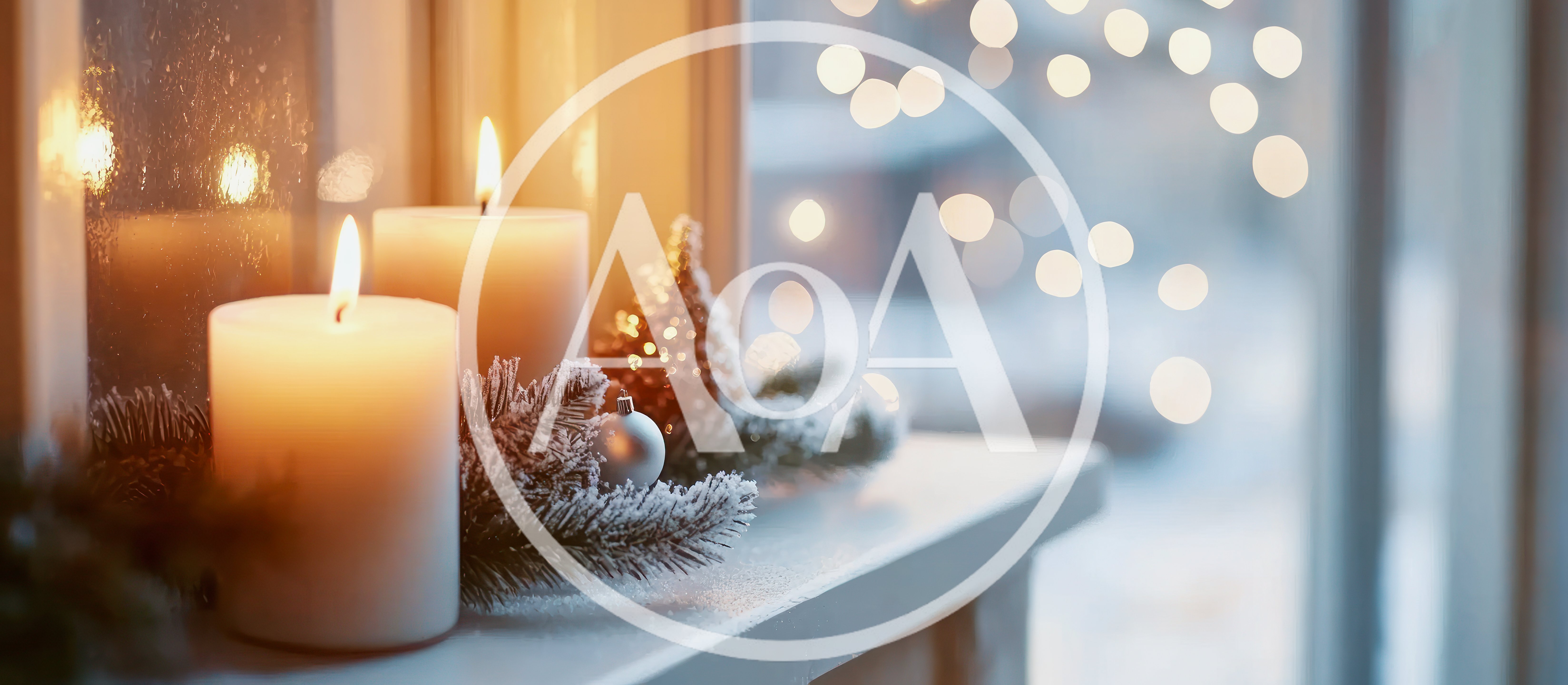 Two Lit Candles On A Snowy Window Sill