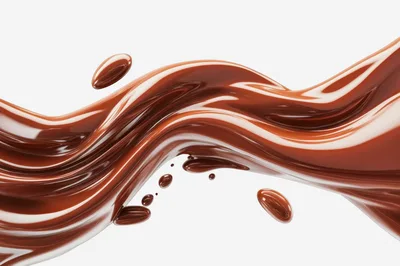 Liquid Chocolate Flowing With Droplets