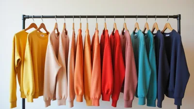 Colorful Sweatshirts Hanging On A Clothing Rack