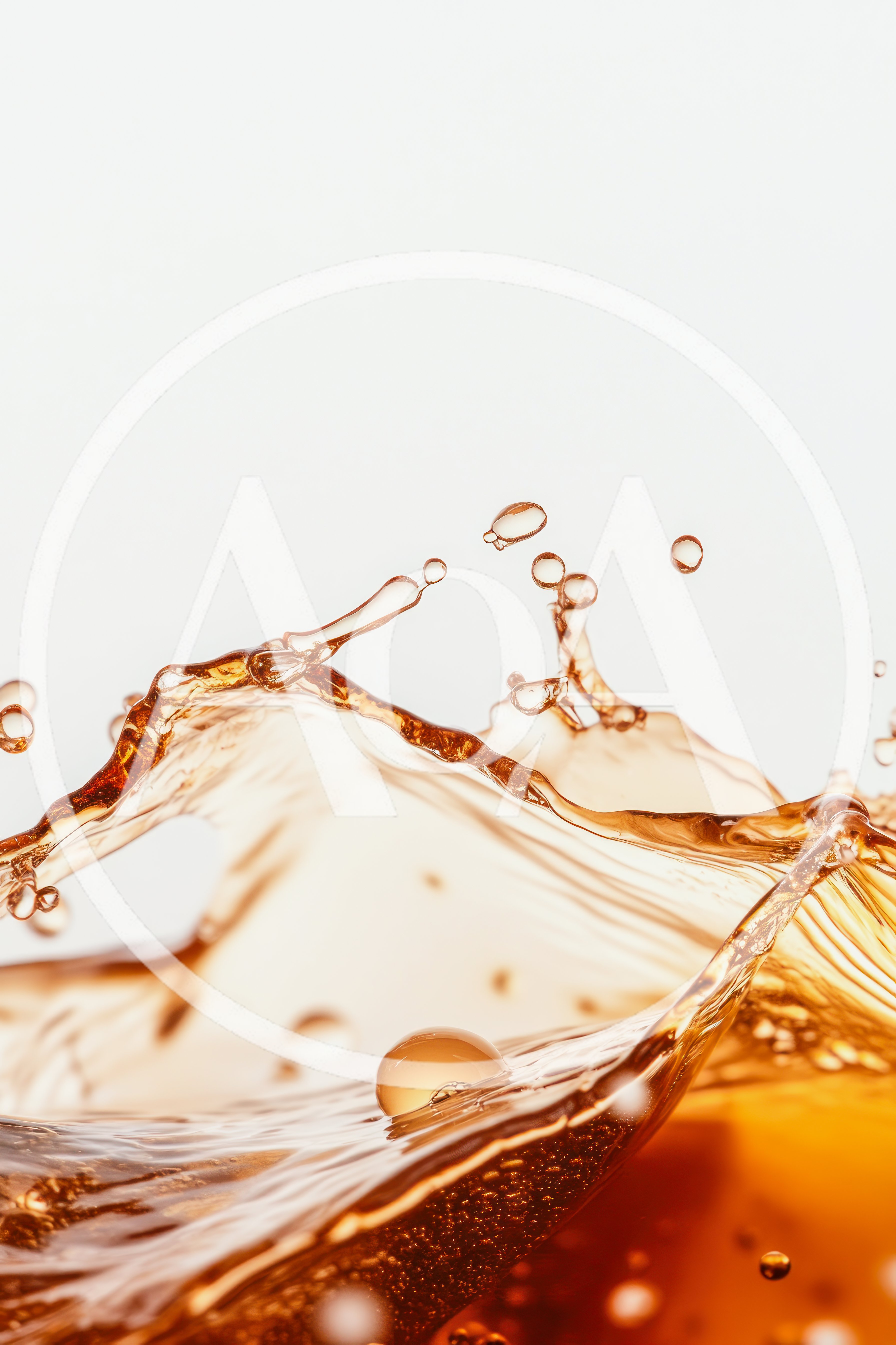 Dynamic Splash Of Amber Liquid Against White Background