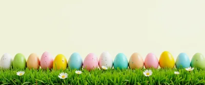 Colorful Easter Eggs Lined Up In Green Grass