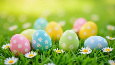 Colorful Easter Eggs Decorated With Flowers In Green Grass