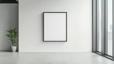 Empty Picture Frame On A Minimalist White Wall
