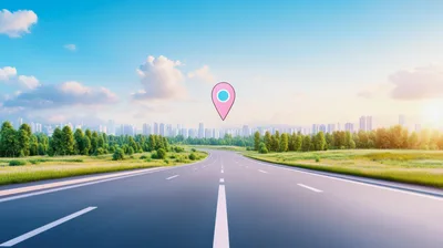 Empty Highway Leading Toward A Distant City Skyline