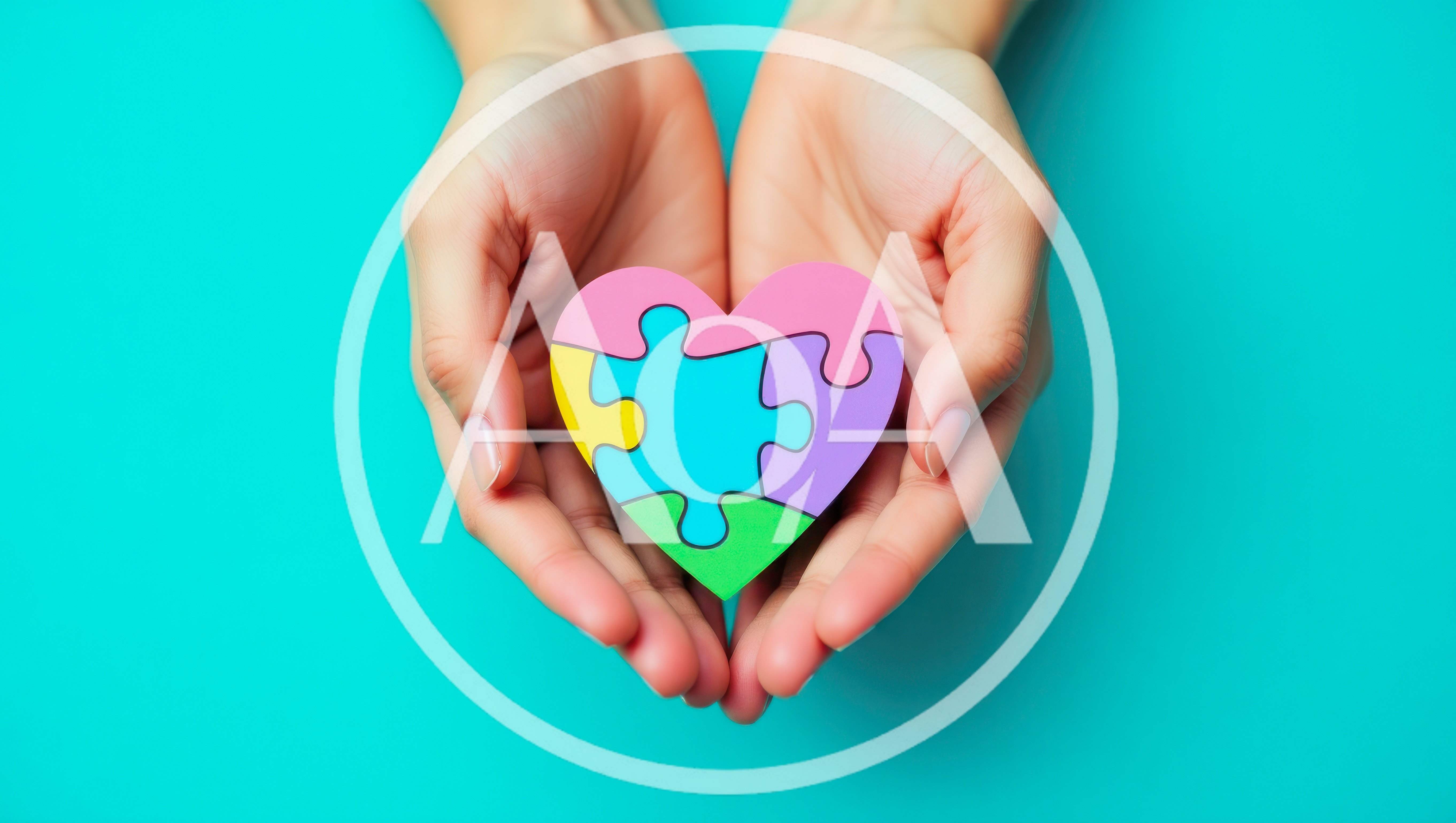 Hands Holding A Colorful Heart Puzzle