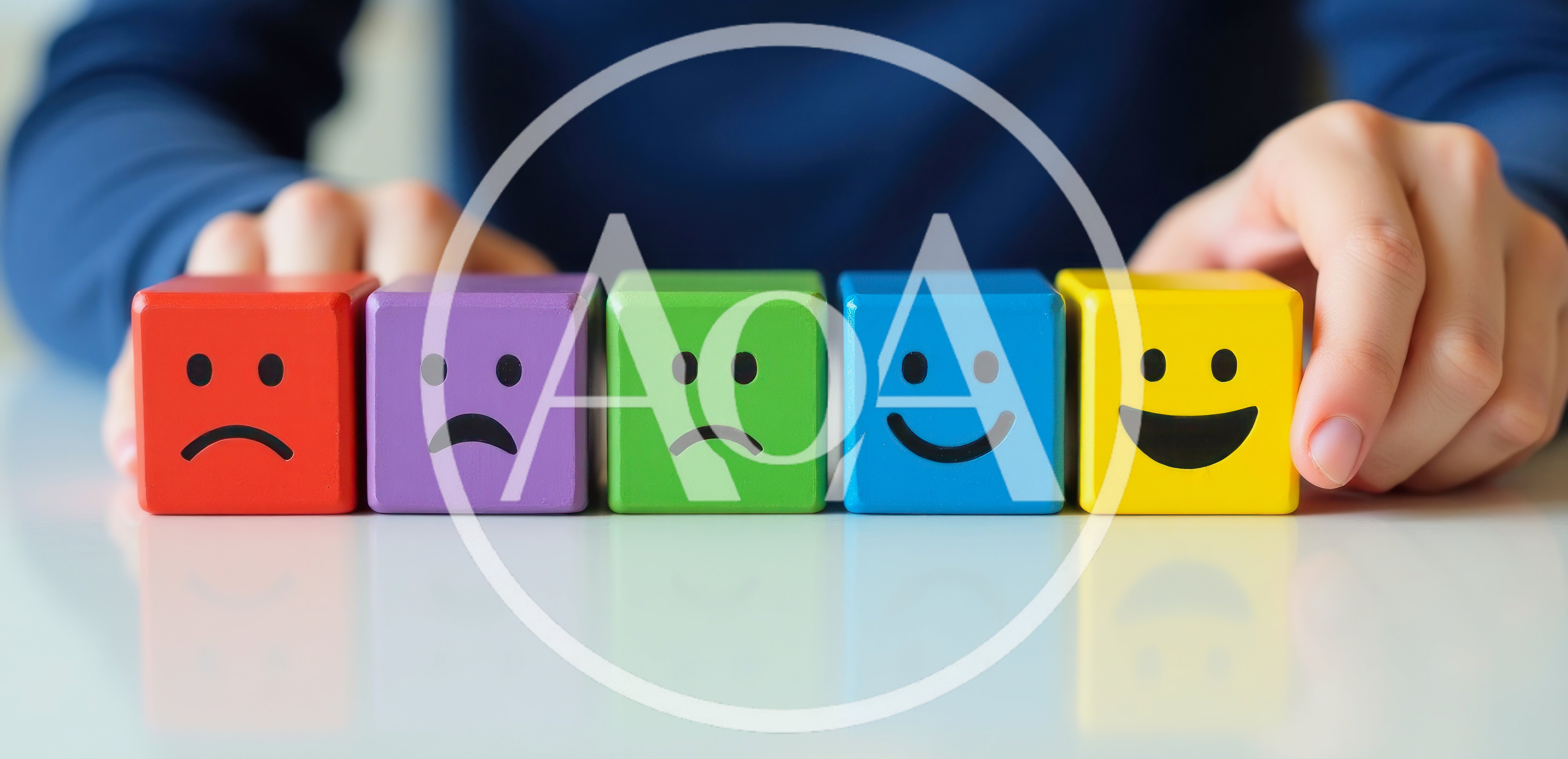 Person Choosing Positive Feedback With Colorful Emotion Blocks