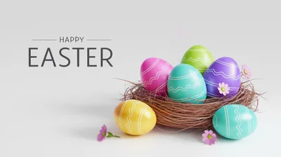 Colorful Easter Eggs In A Nest With Flowers