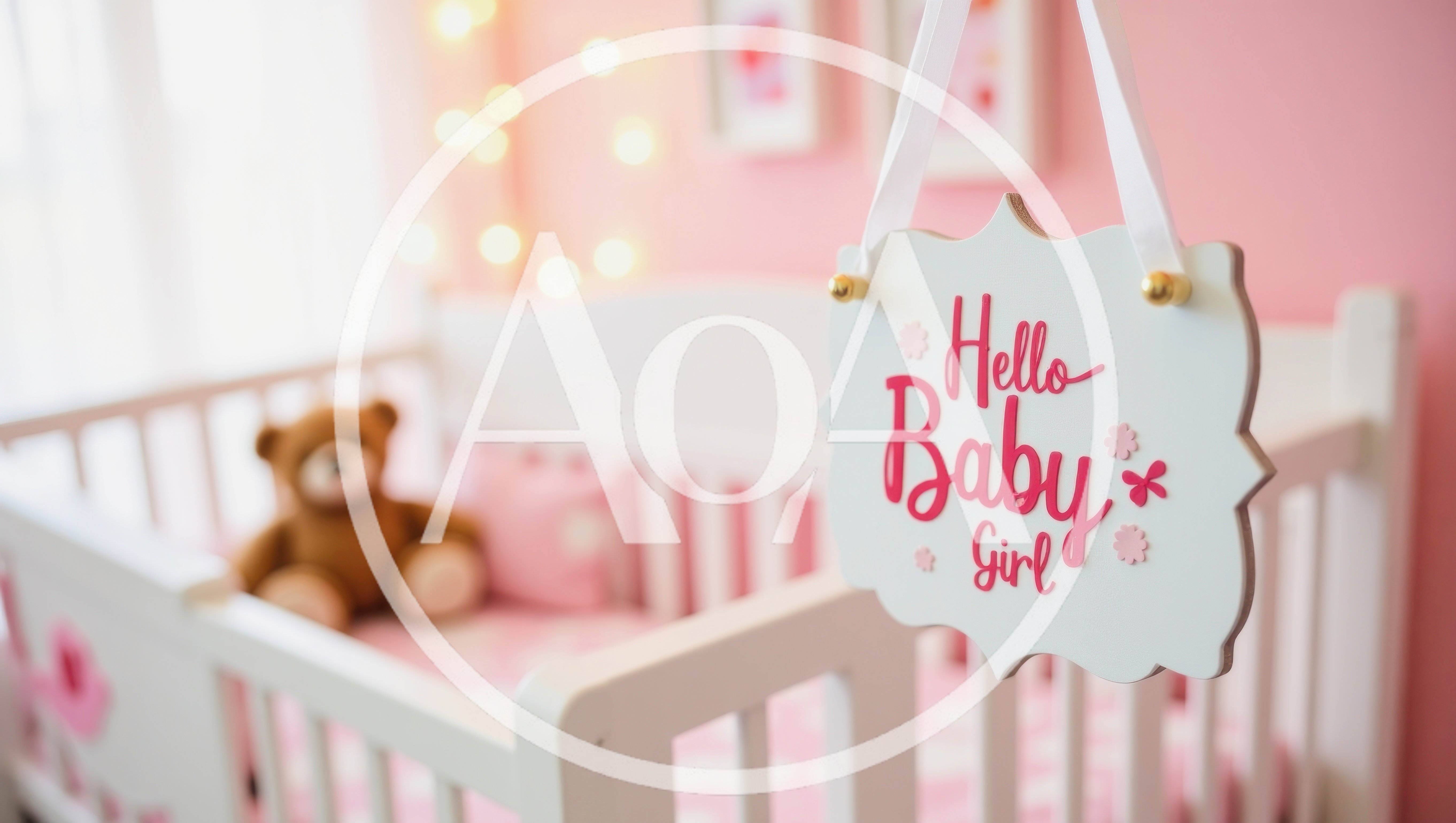 Hello Baby Girl Sign Hanging Over Nursery Crib