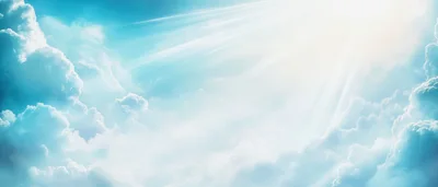 Bright Sunbeams Shining Through Fluffy Blue Clouds