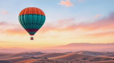Hot Air Balloon Floating Over Rolling Hills At Sunset