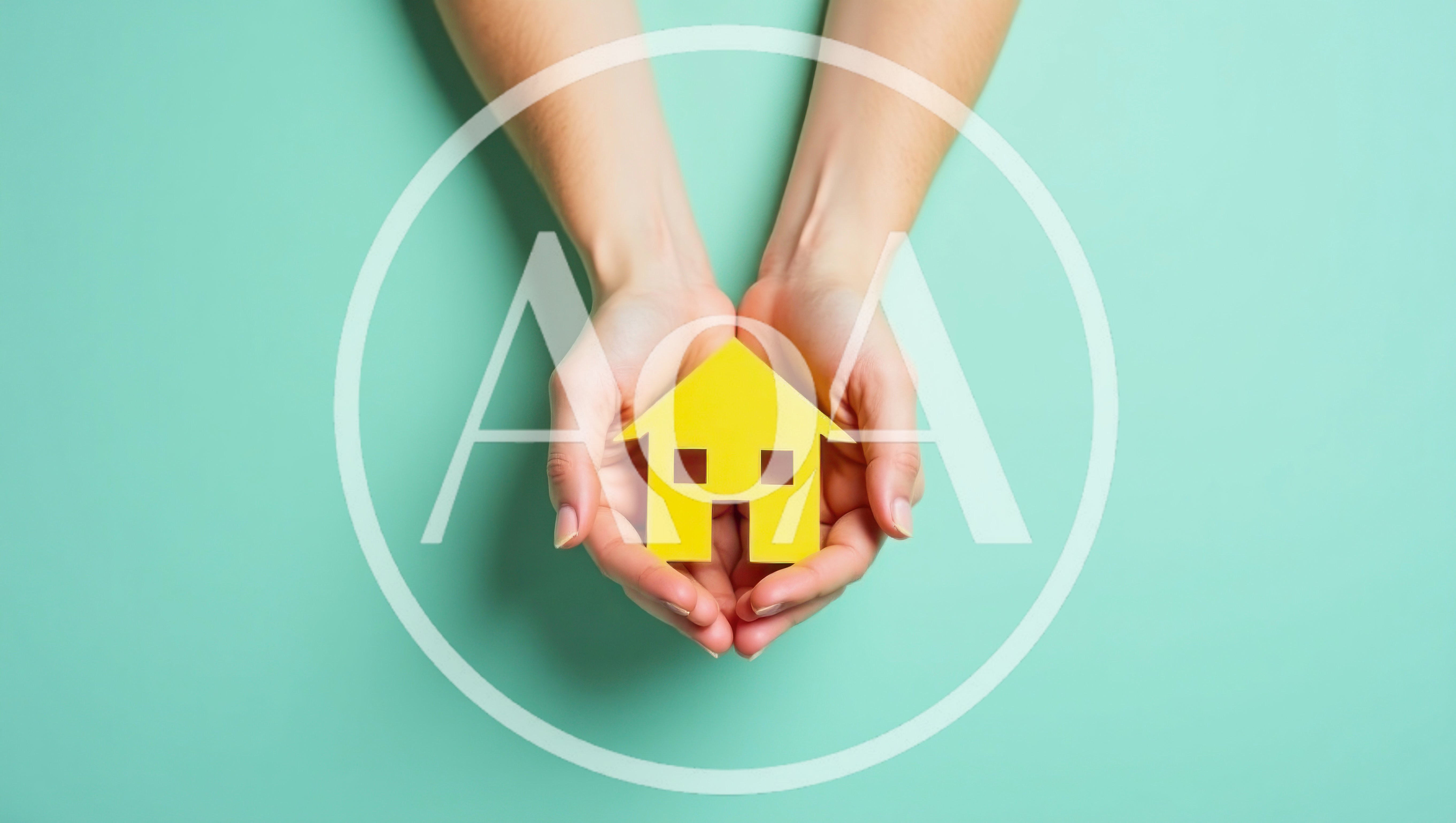 Hands Holding A Yellow Paper House Cutout