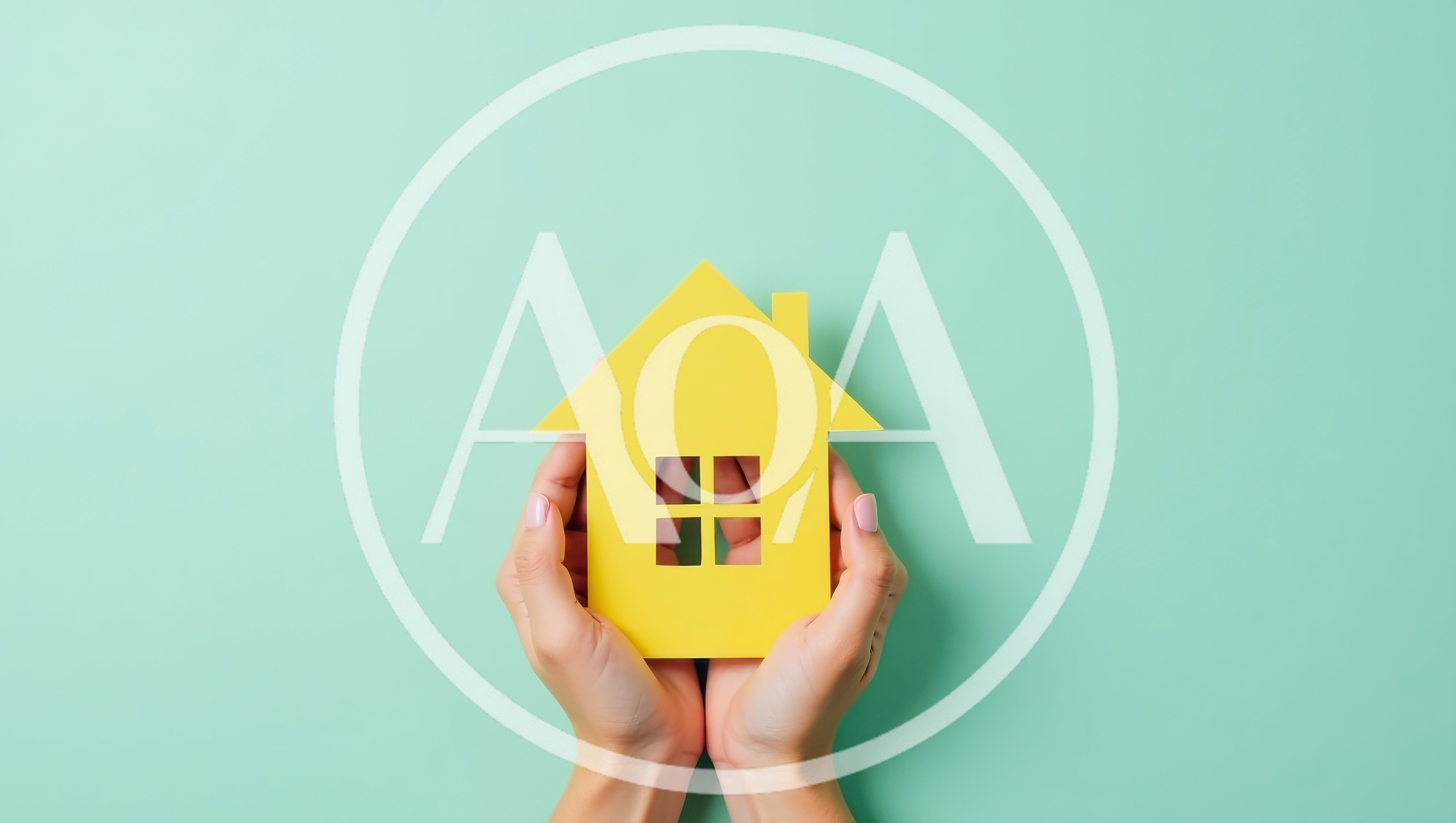 Hands Holding A Yellow Paper House Cutout